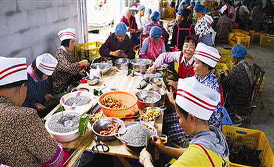 村企“联姻”添动力 灰粽产业促增收