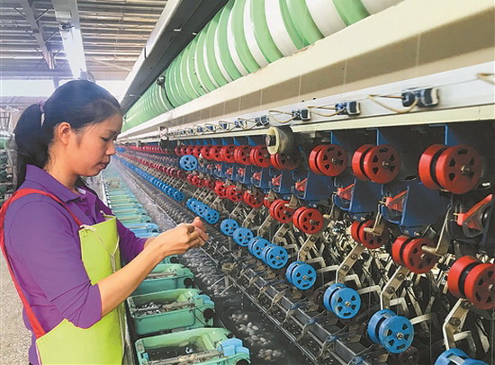 宜州17家茧丝绸加工企业吸纳2600多名贫困人口就业